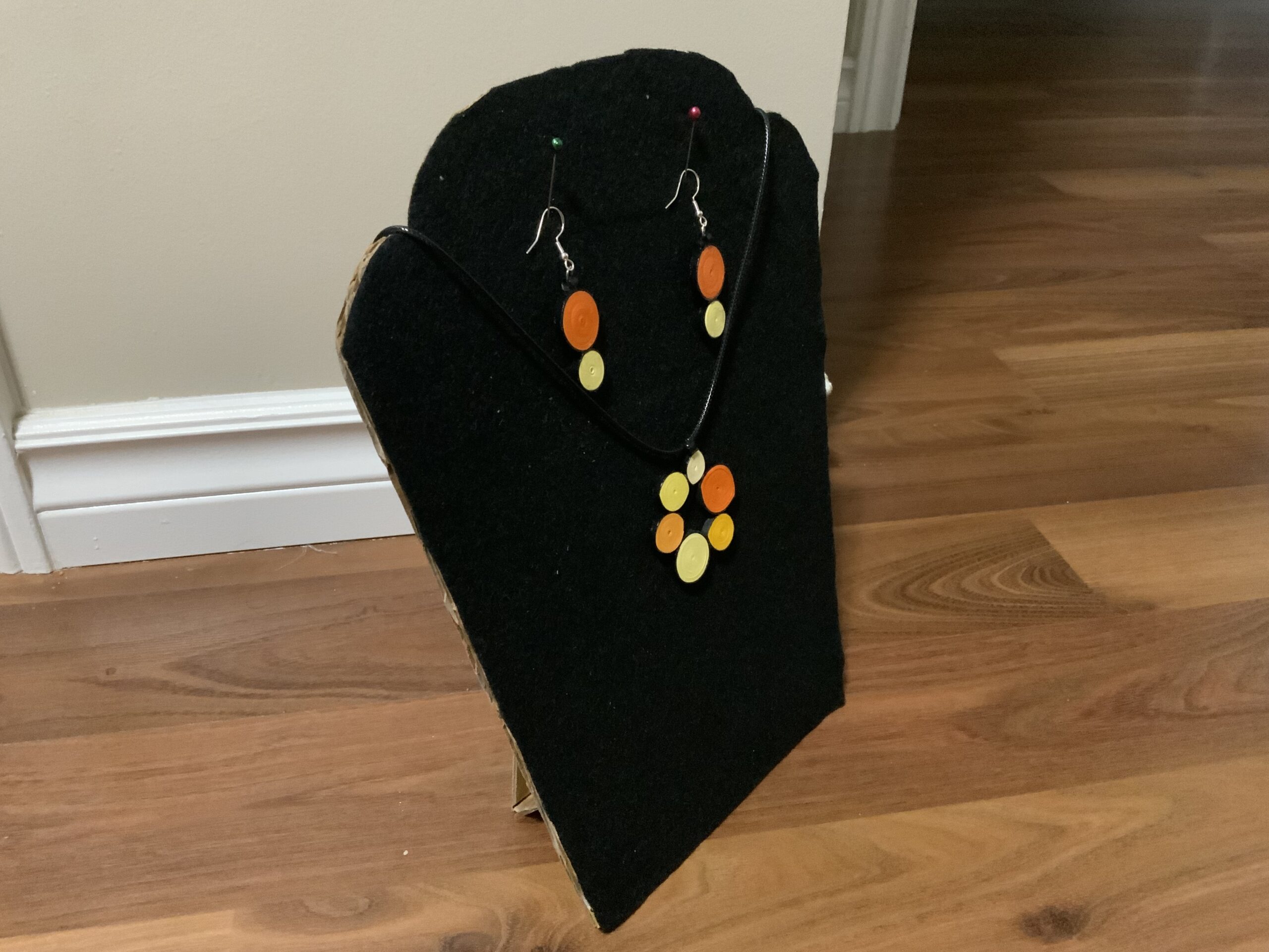 Circular-style earrings and necklace set showcasing warm, elegant orange and yellow tones. - Image 6