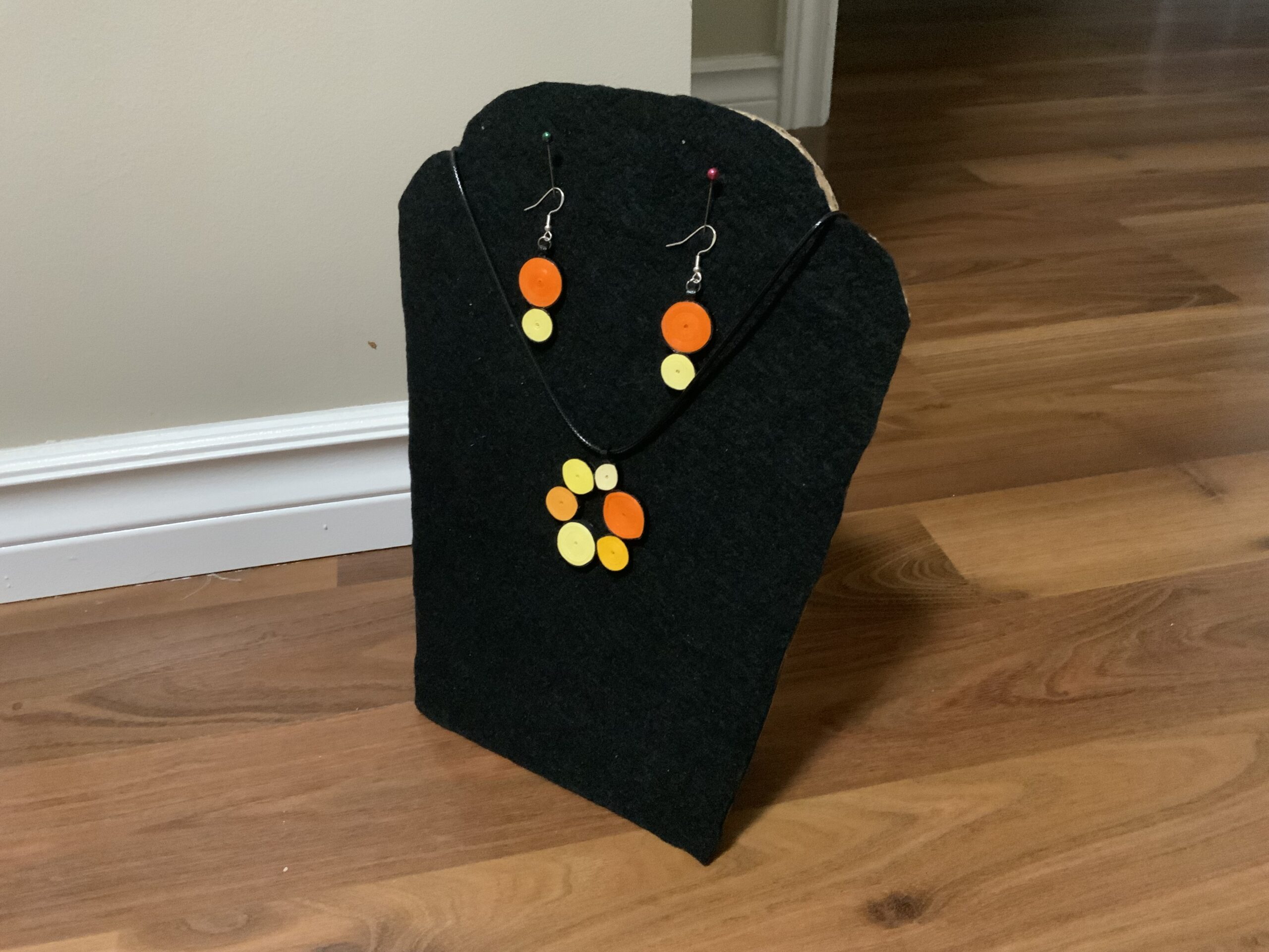 Circular-style earrings and necklace set showcasing warm, elegant orange and yellow tones. - Image 5